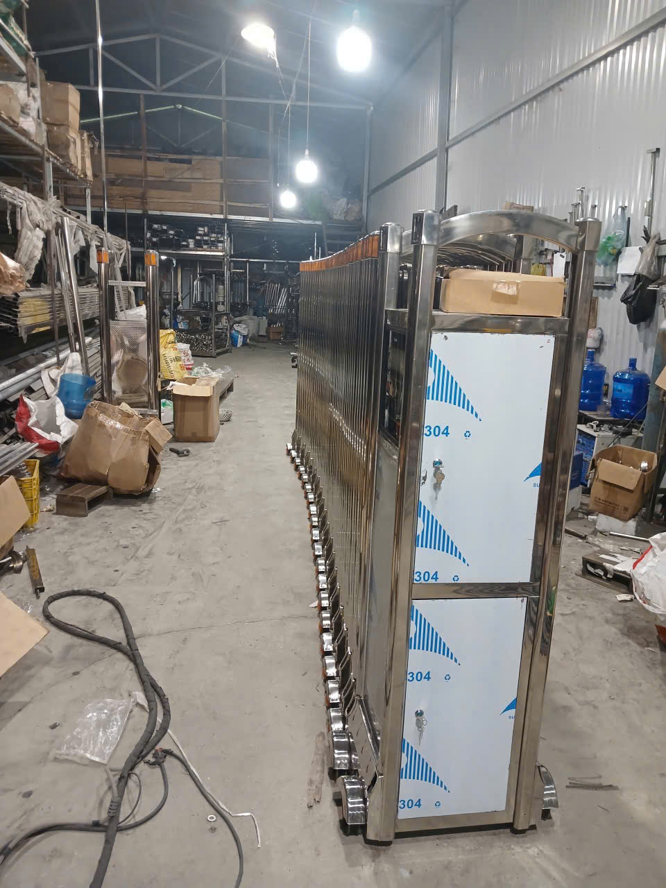 cổng xếp inox tại nam định